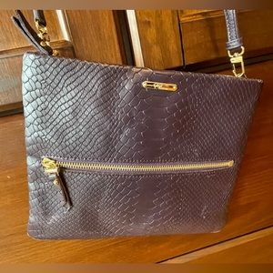 GiGi New York Leather Crossbody Bag. Color Deep Purple with Front Zipper.